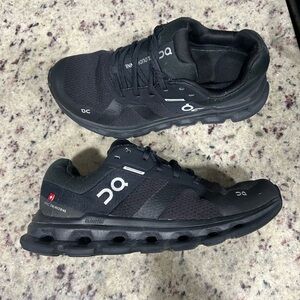 On Running Black Athletic Shoes with CloudTec Cushioning